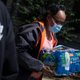 Operation Good hands out cases of water to residents in Jackson, Mississippi, on March 24, 2022.